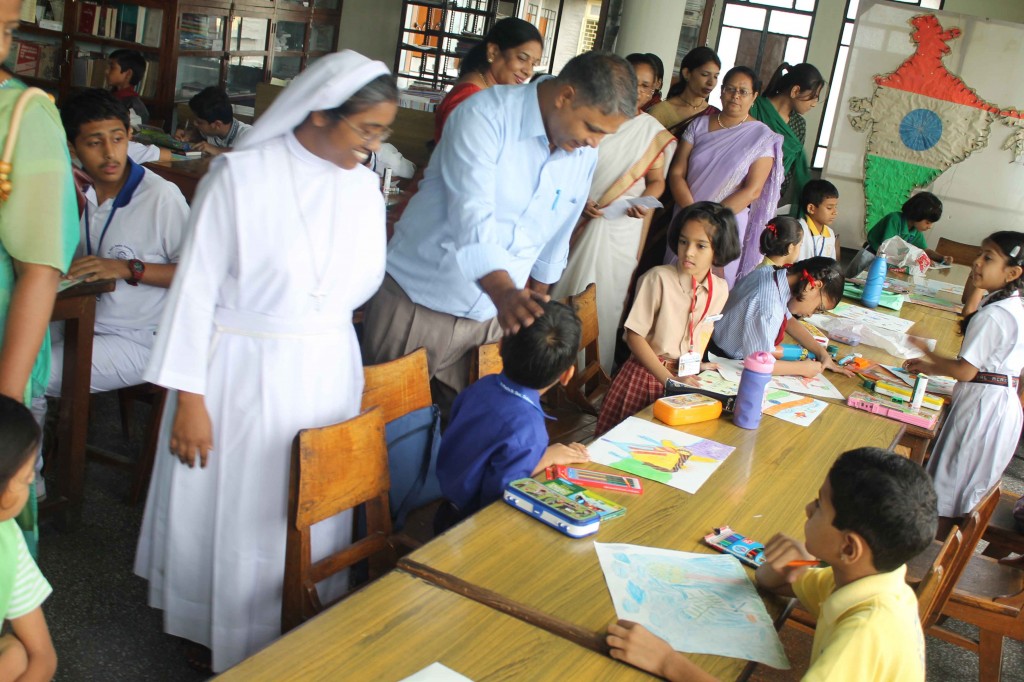 Sr.Priya PSA and Fr. Norbert Herman interacting with students.